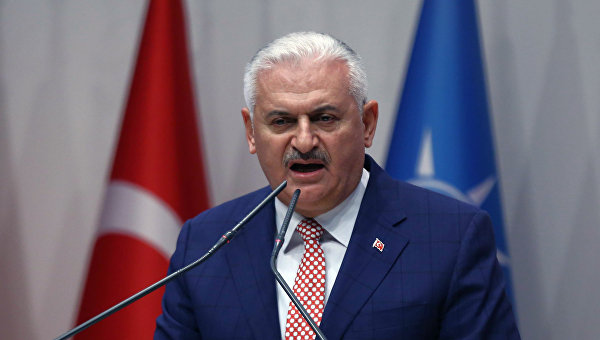 Премьер Турции: правительство продолжит нормализацию отношений с Россией