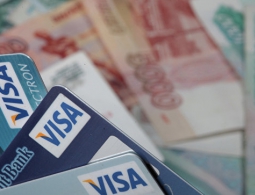Visa разрешила банкам брать комиссии за снятие наличных