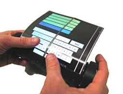 Создан сенсорный планшет, который можно скрутить в свиток